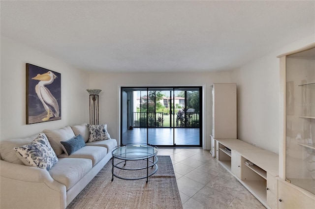 living room with light tile patterned floors