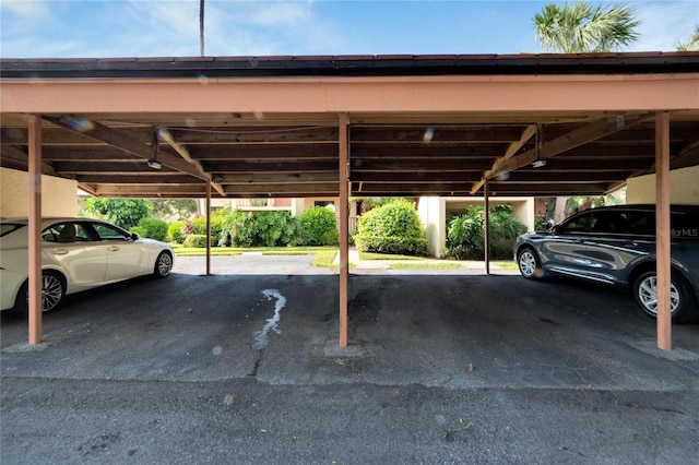 view of parking / parking lot with a carport