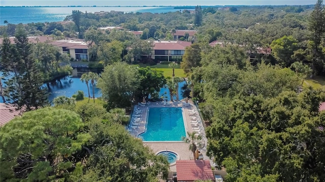 bird's eye view with a water view