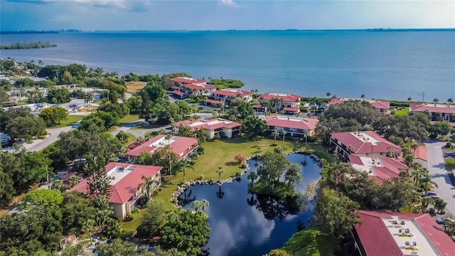 bird's eye view with a water view