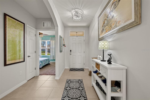 foyer with light tile patterned floors