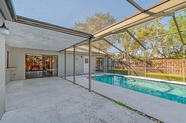 view of pool featuring a patio and a lanai