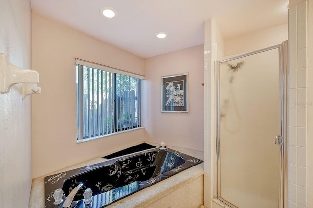 bathroom with independent shower and bath