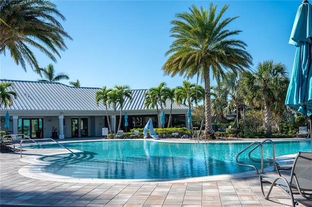 view of swimming pool featuring a patio