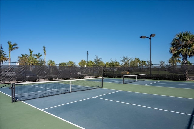 view of sport court featuring basketball court