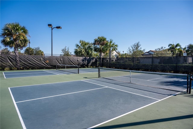 view of tennis court with basketball court