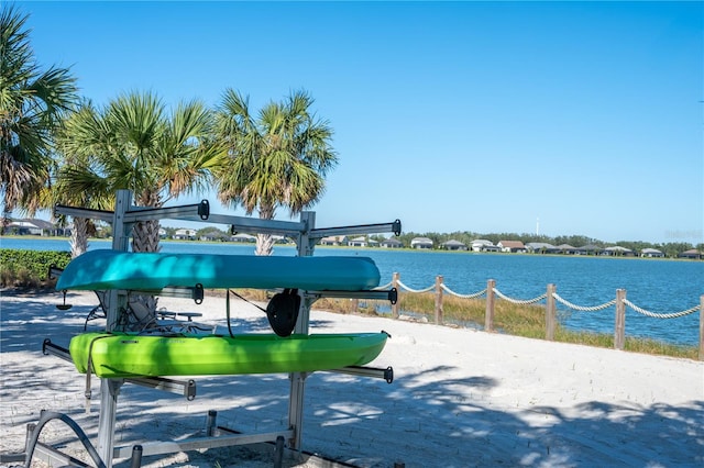 surrounding community featuring a water view