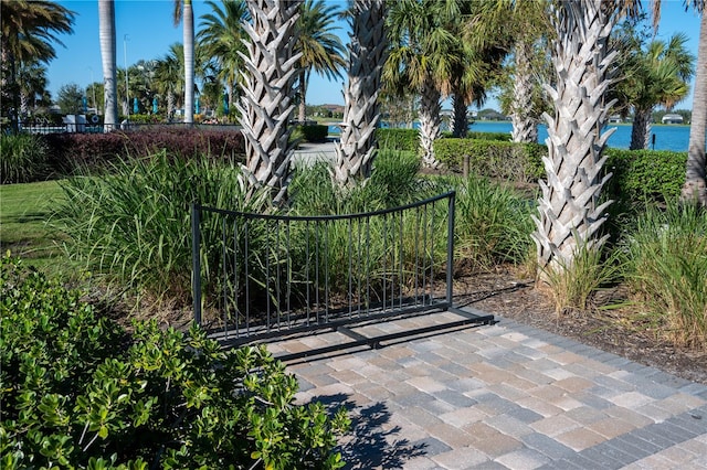 view of gate featuring a water view