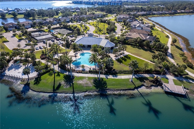 birds eye view of property with a water view