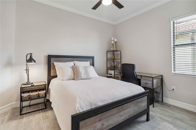 bedroom featuring ceiling fan and crown molding