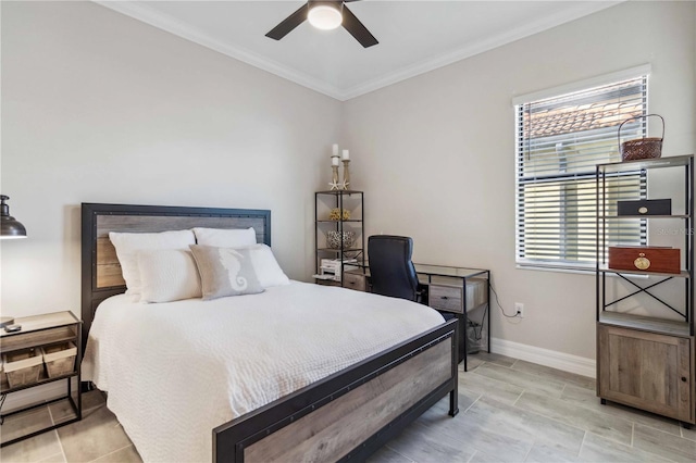 bedroom with ceiling fan and ornamental molding