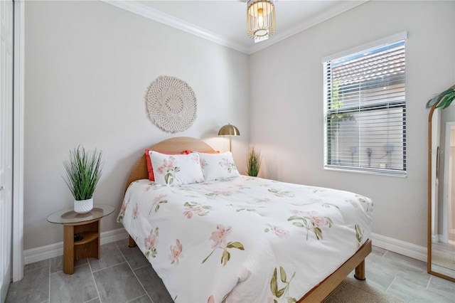 bedroom featuring crown molding