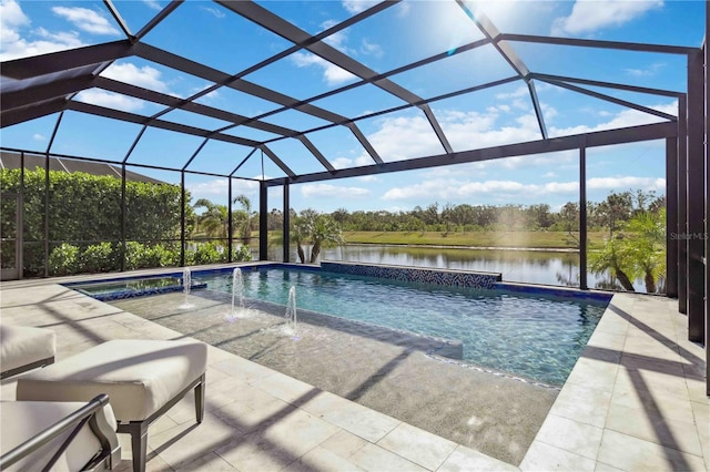 view of pool with pool water feature, glass enclosure, a patio area, and a water view