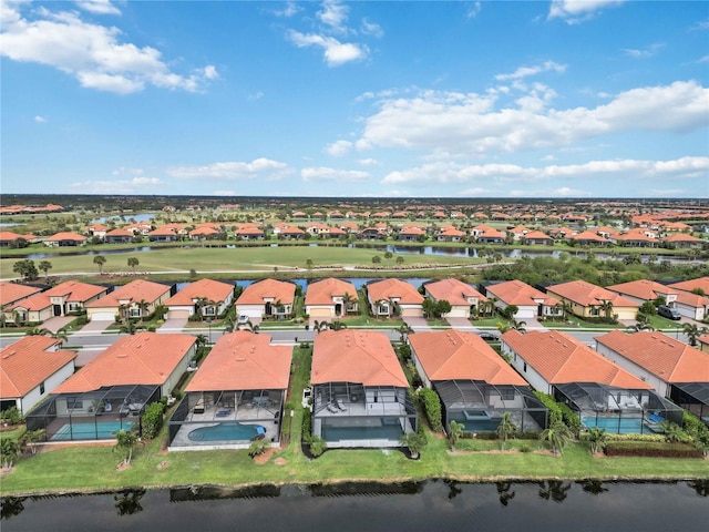 drone / aerial view with a water view