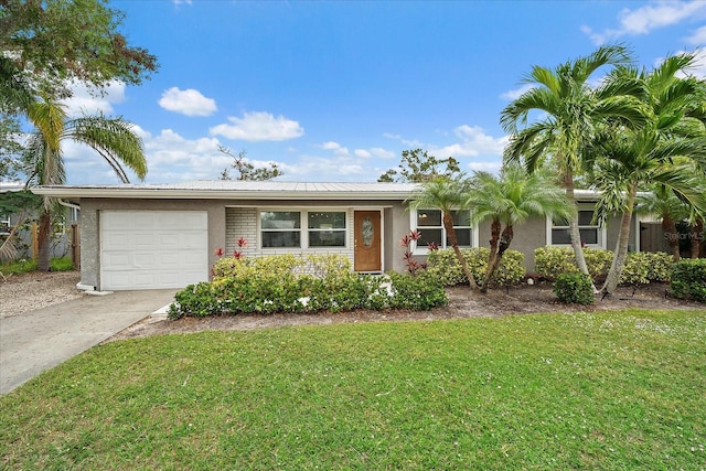 single story home with a garage and a front yard