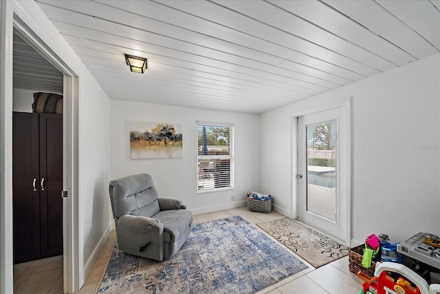 living area with light tile patterned floors