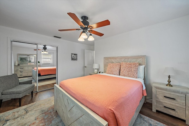 bedroom with ceiling fan and hardwood / wood-style floors