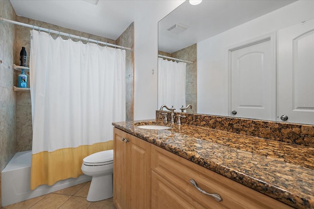 full bathroom featuring tile patterned flooring, vanity, shower / tub combo with curtain, and toilet