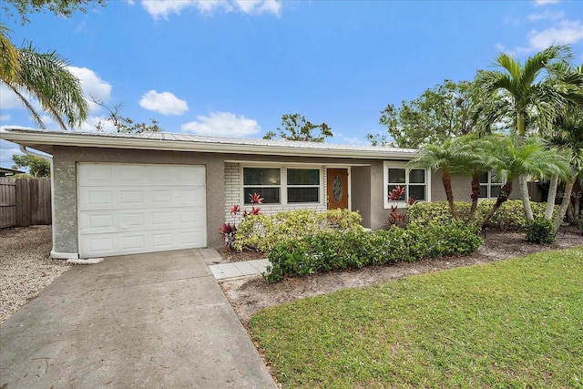 single story home featuring a garage