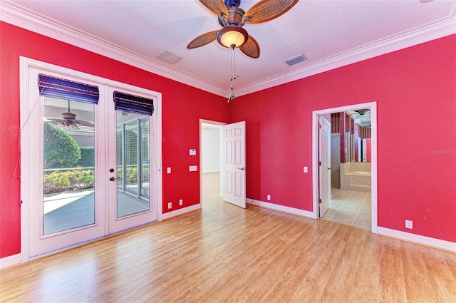 empty room featuring french doors, light hardwood / wood-style floors, ceiling fan, and crown molding