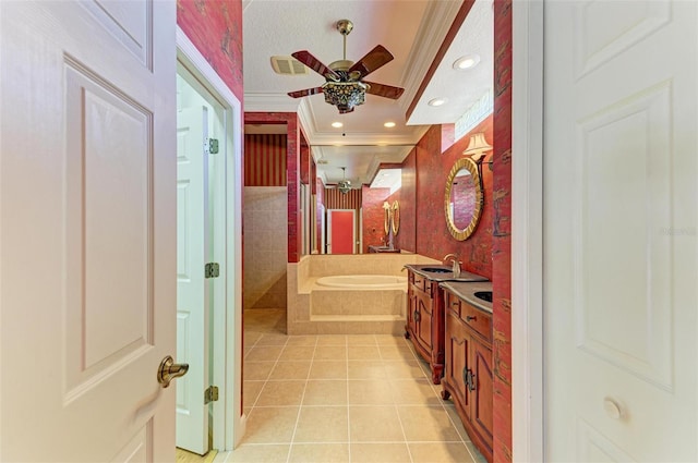 bathroom with ceiling fan, plus walk in shower, tile patterned flooring, crown molding, and vanity