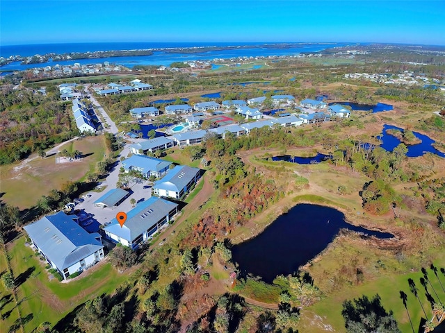 bird's eye view with a water view