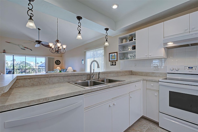 kitchen featuring white cabinetry, sink, pendant lighting, and white appliances