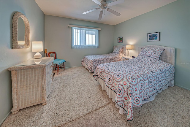 bedroom featuring ceiling fan and carpet floors