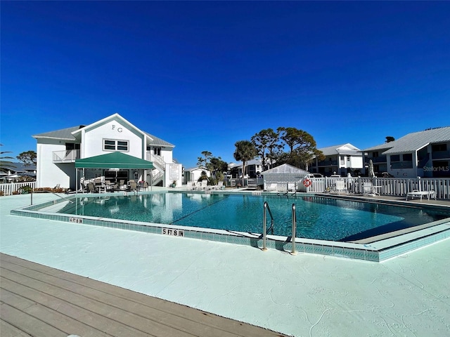 view of swimming pool with a gazebo