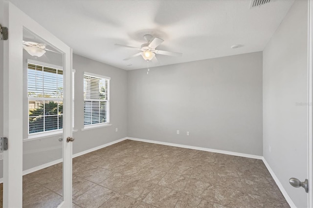 empty room with ceiling fan