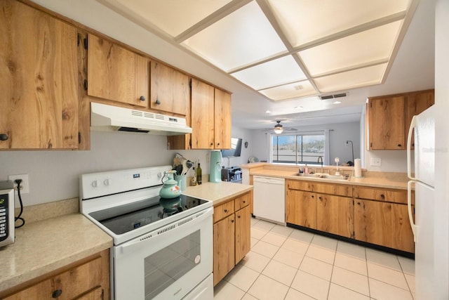 kitchen with light tile patterned floors, white appliances, ceiling fan, and sink