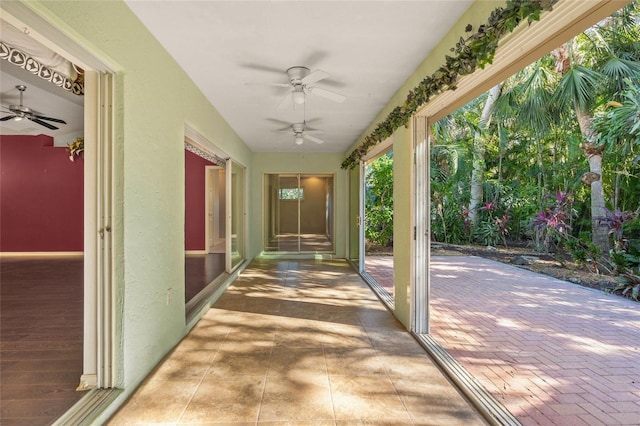 view of patio / terrace featuring ceiling fan