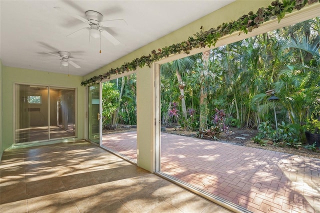 interior space featuring ceiling fan