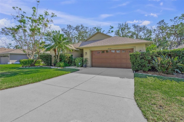 ranch-style house with a garage and a front yard