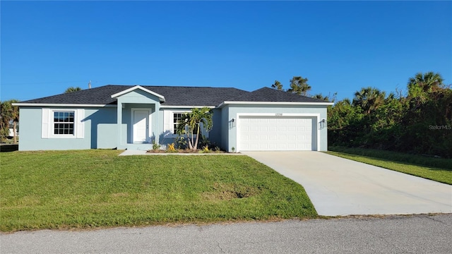 ranch-style home featuring a front lawn and a garage