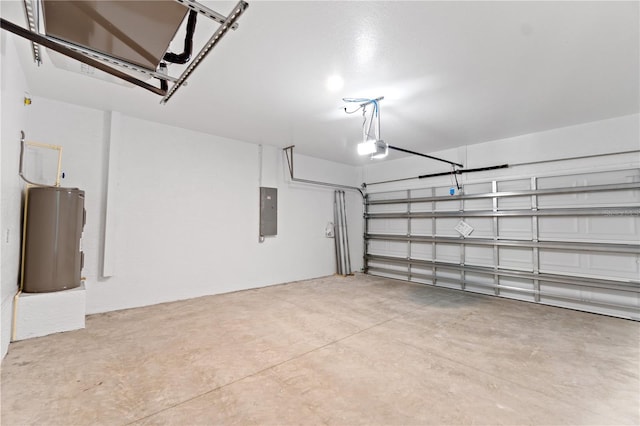 garage with a garage door opener, electric panel, and water heater