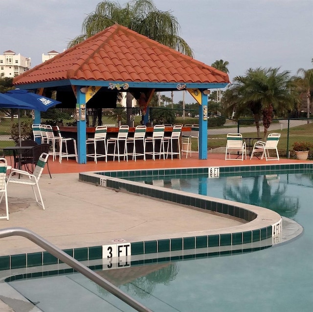 view of swimming pool with a gazebo