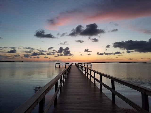 view of dock with a water view