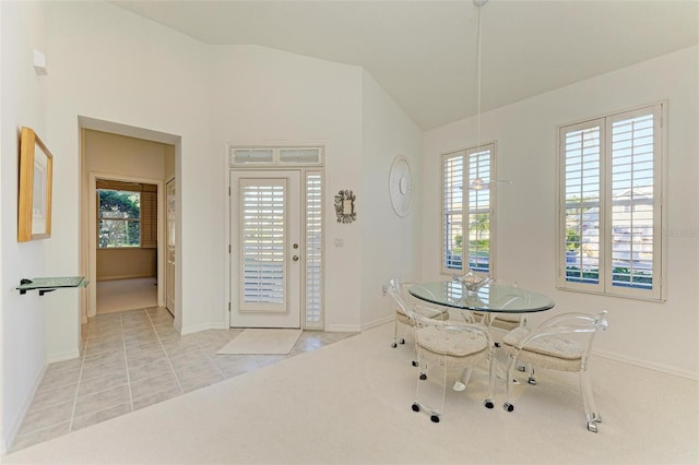 view of carpeted dining area