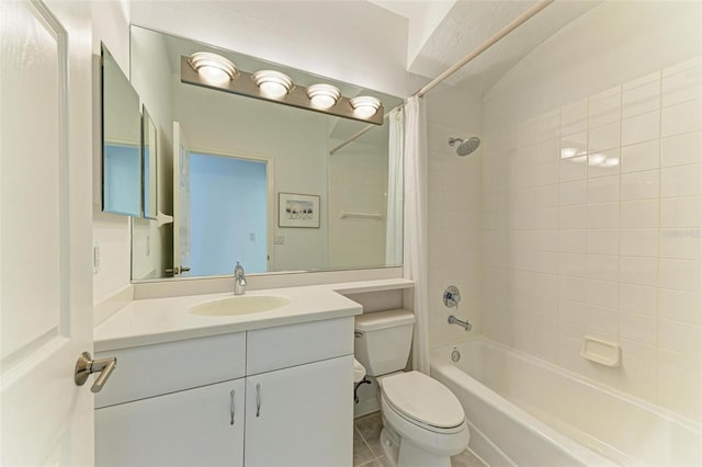 full bathroom featuring tile patterned flooring, vanity, toilet, and shower / bathtub combination with curtain