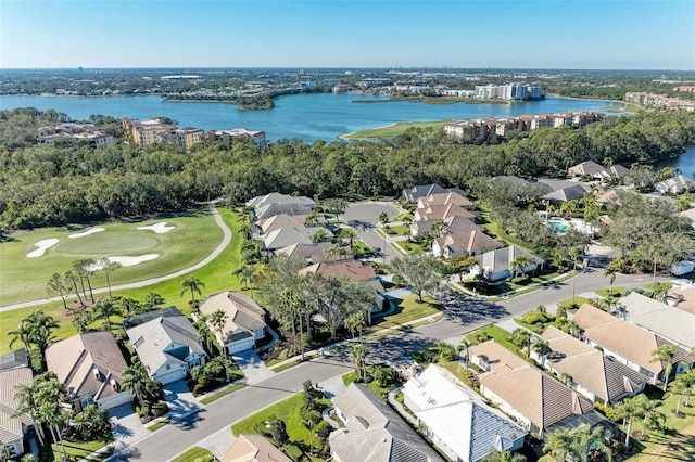 drone / aerial view with a water view