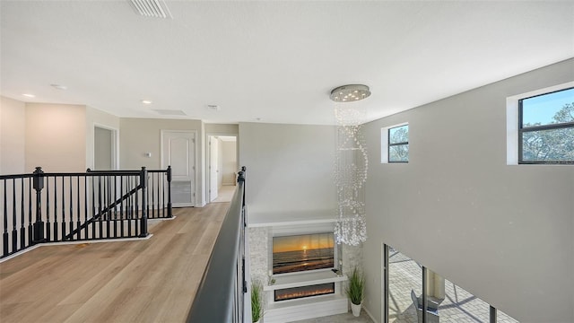 stairway featuring wood-type flooring