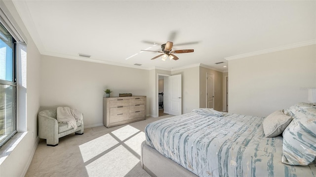 bedroom with ceiling fan, light carpet, and ornamental molding