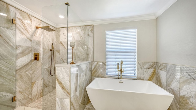 bathroom with plus walk in shower, a healthy amount of sunlight, tile walls, and ornamental molding