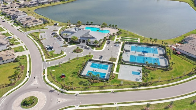 birds eye view of property featuring a water view