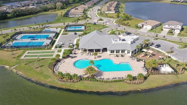 bird's eye view with a water view