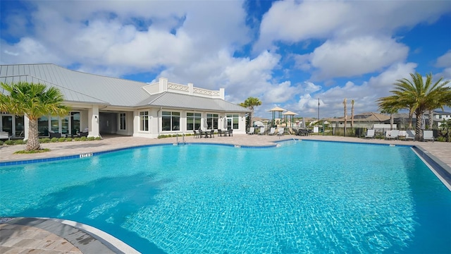 view of pool featuring a patio area