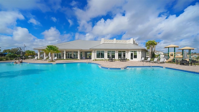 view of pool featuring a patio area