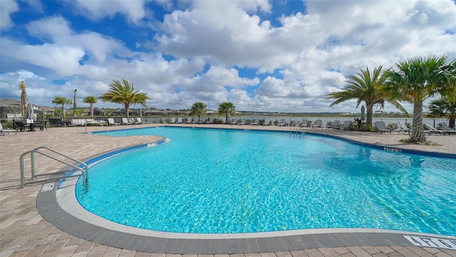 view of swimming pool featuring a patio