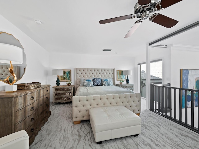 carpeted bedroom with ceiling fan